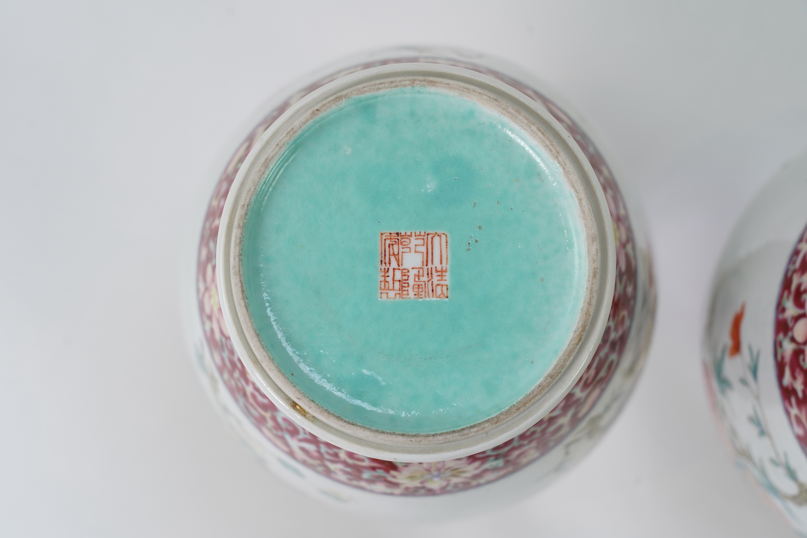 A pair of Chinese famille rose ‘sanduo’ vases, Qianlong seal mark, 19th century